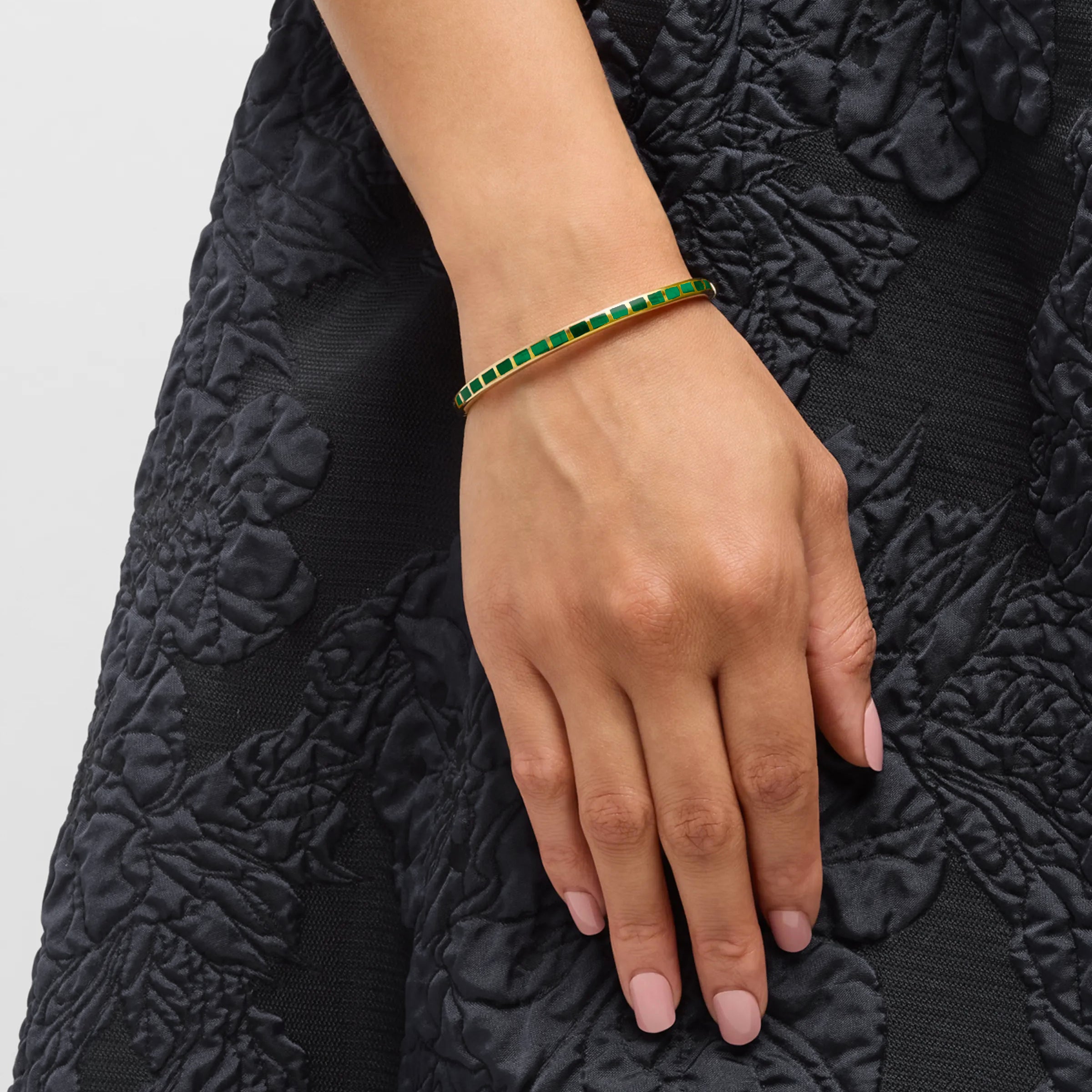 Channel-set green malachite square tile gold vermeil hinged bangle bracelet worn on model's wrist