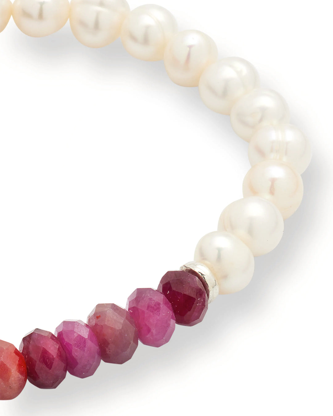 Close up of the faceted red ruby beads silver tone spacer and freshwater pearls on the Men's Freshwater Pearl and Red Ruby Gemstone Split Beaded Bracelet.