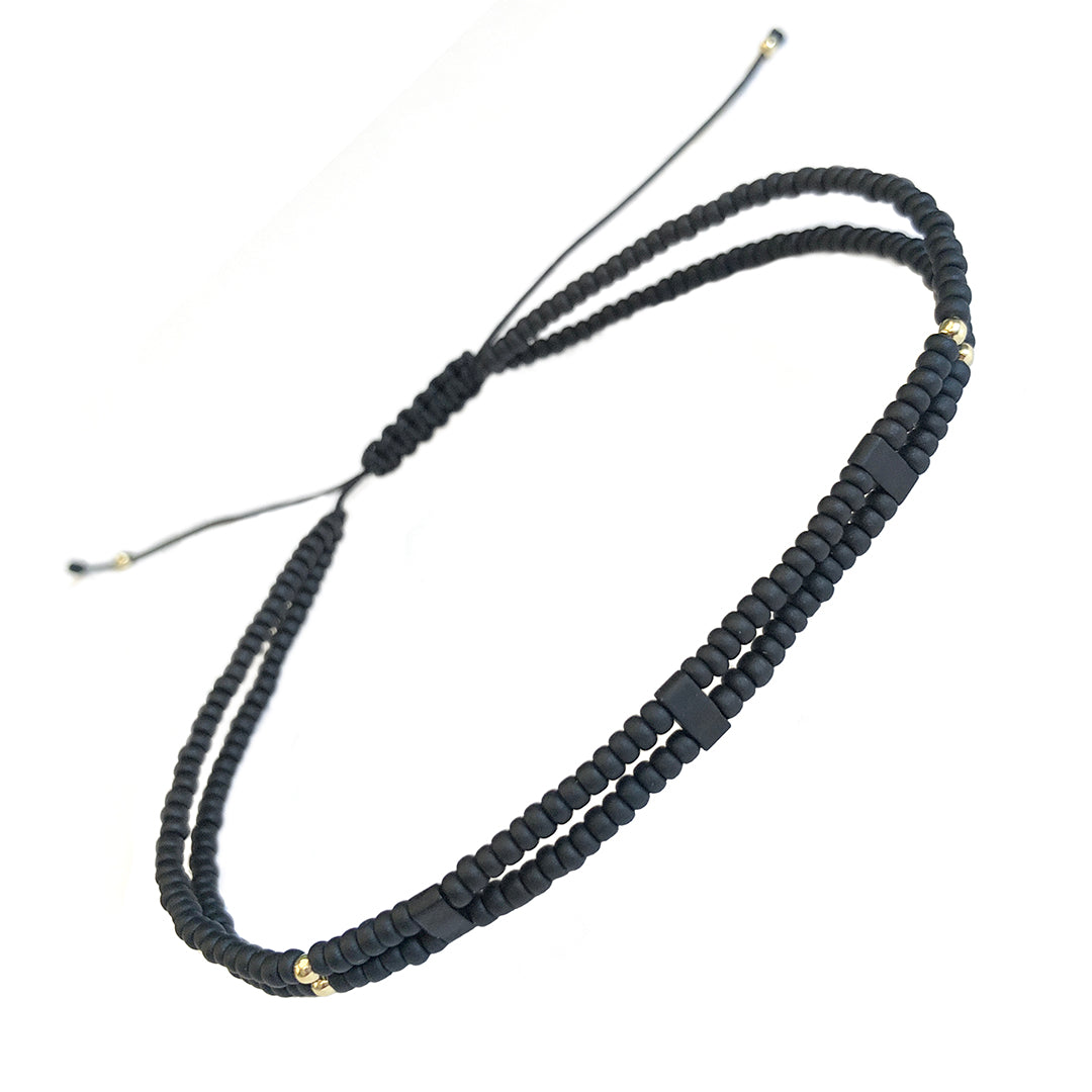 Front view of the Double Strand Black Micro Bead Wax Pull Cord Sterling Silver Bracelet.