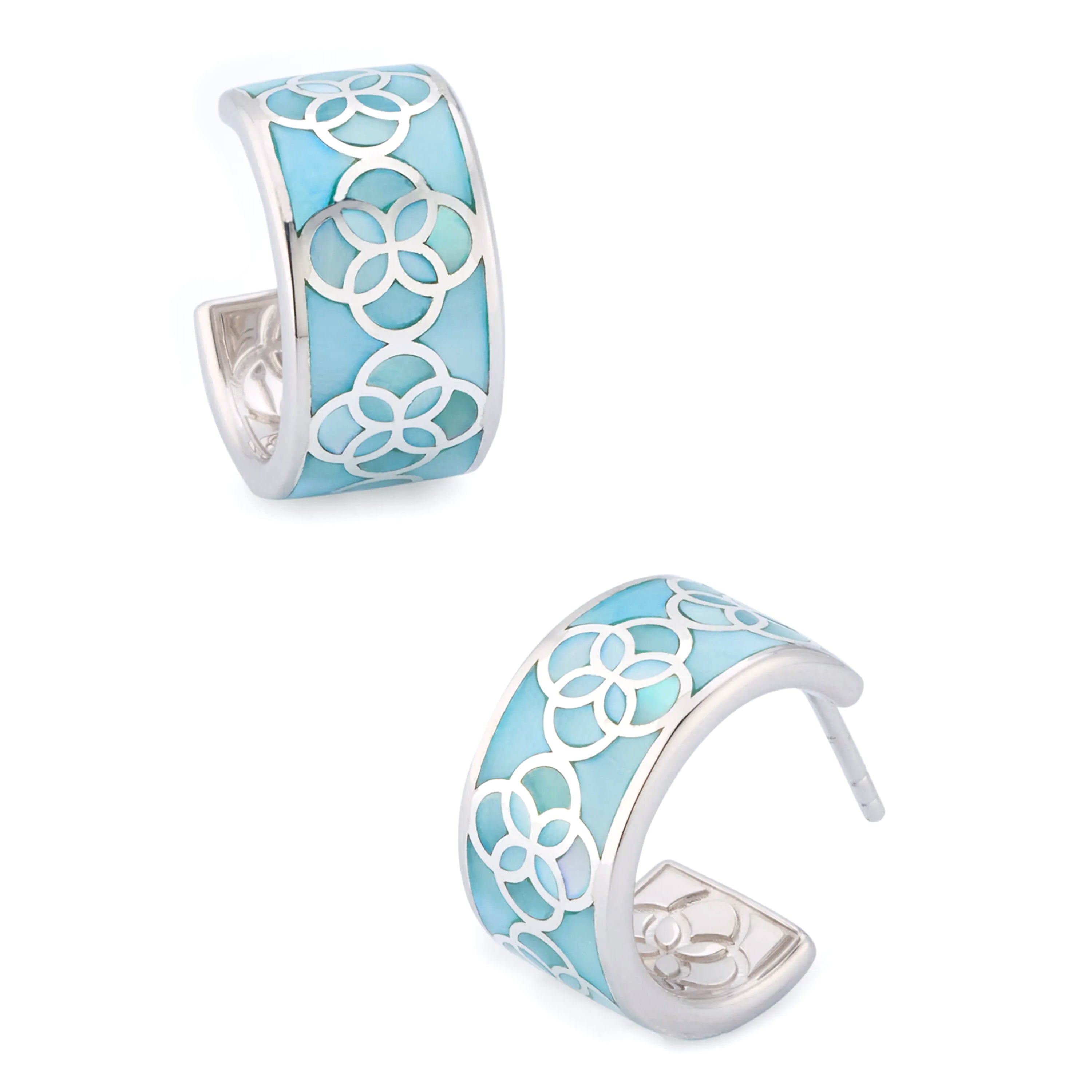 Sterling silver blue enamel petal Seed of Life cutwork wide huggie hoop earrings pair angled view showing full exterior face with continuous Seed of Life cutwork silver lattice over powder blue enamel ground by Jan Leslie