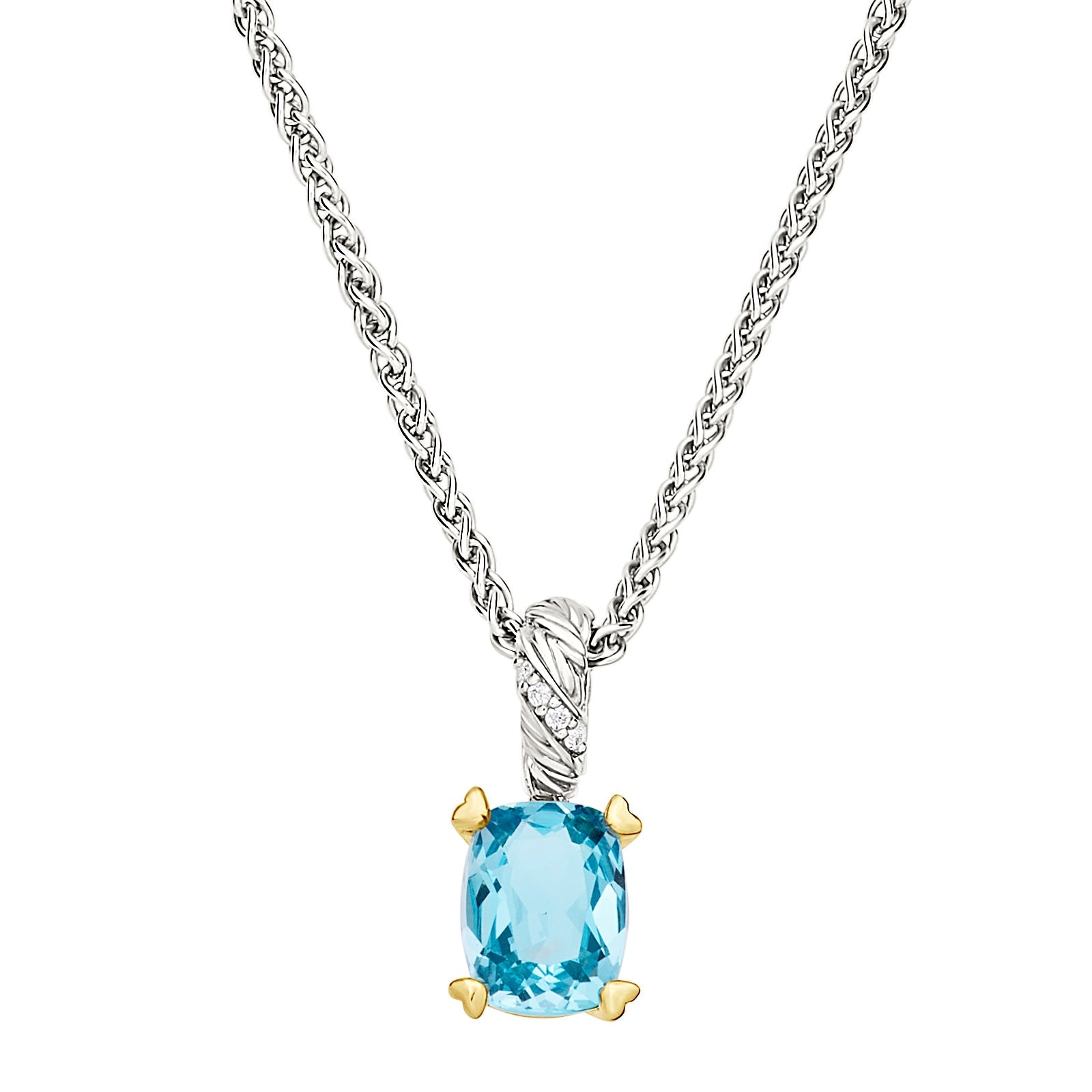 Oval blue topaz pendant with diamond accents on a braided sterling silver wheat chain with gold vermeil prong setting — a luminous, ocean-blue statement necklace crafted for effortless elegance.