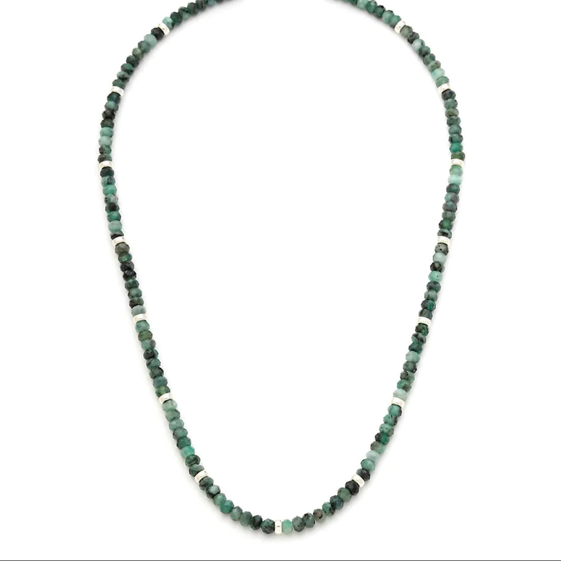 Long strand necklace of faceted emerald rondelle beads in varying shades of green with silver rondelle spacers.