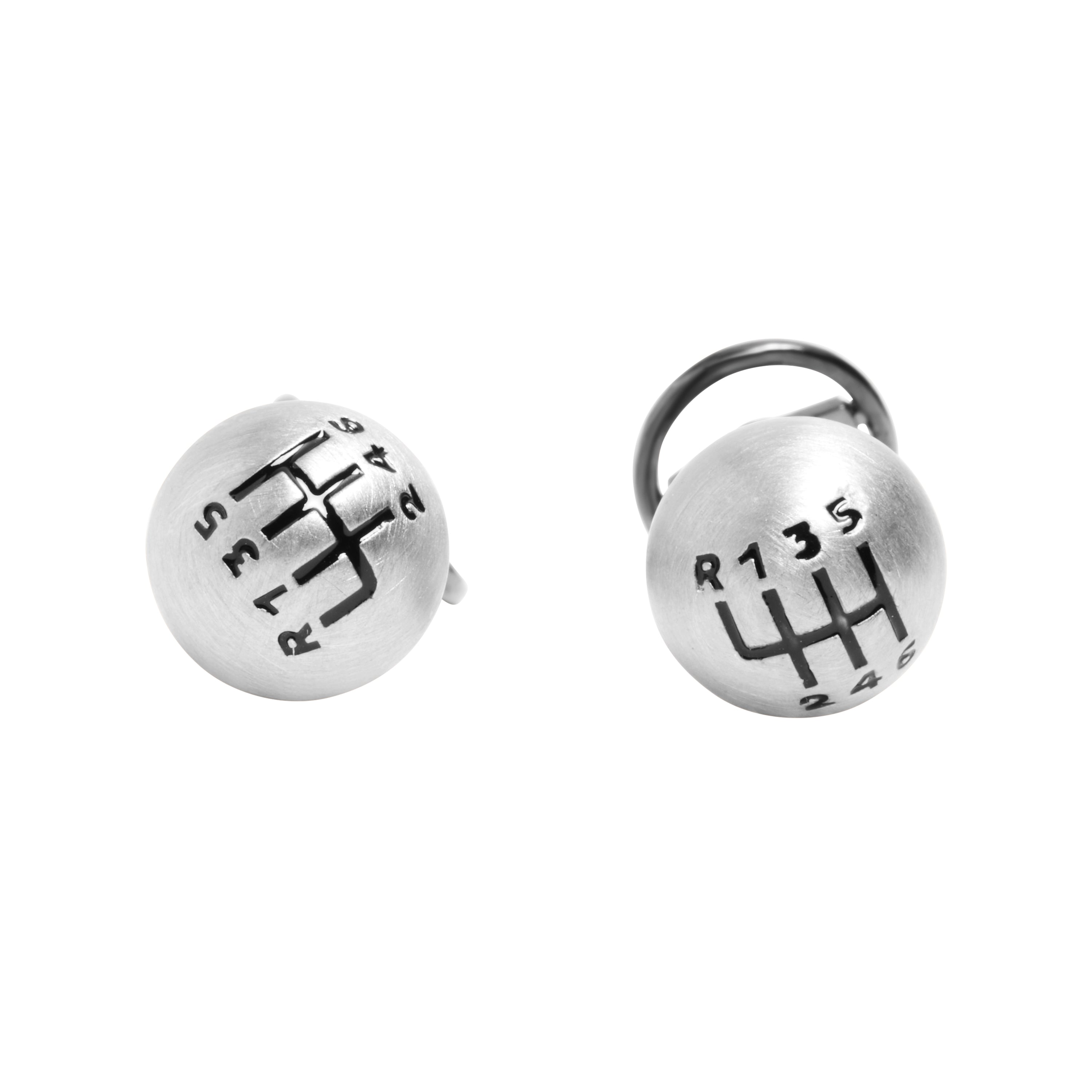 Brushed sterling silver 3D manual gear shift knob cufflinks with engraved 6-speed H-pattern diagram, luxury automotive men's jewelry.