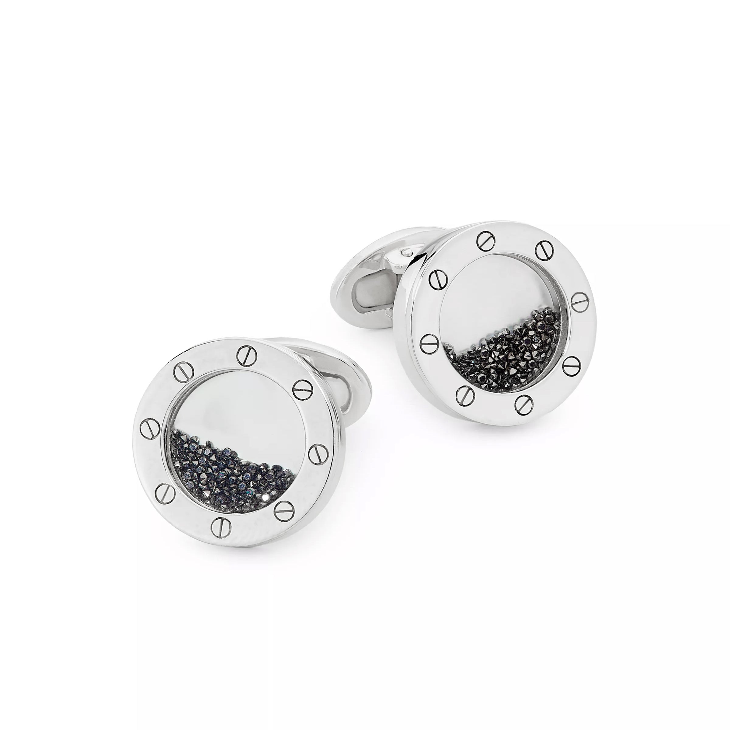 Sterling silver round porthole cufflink with loose black diamond crystals floating in glass dome and screw-detail bezel showing bullet-back closure by Jan Leslie.