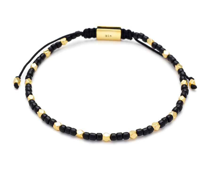 Black onyx seed bead and gold vermeil faceted bead bracelet with adjustable macramé cord and gold clasp — Jan Leslie