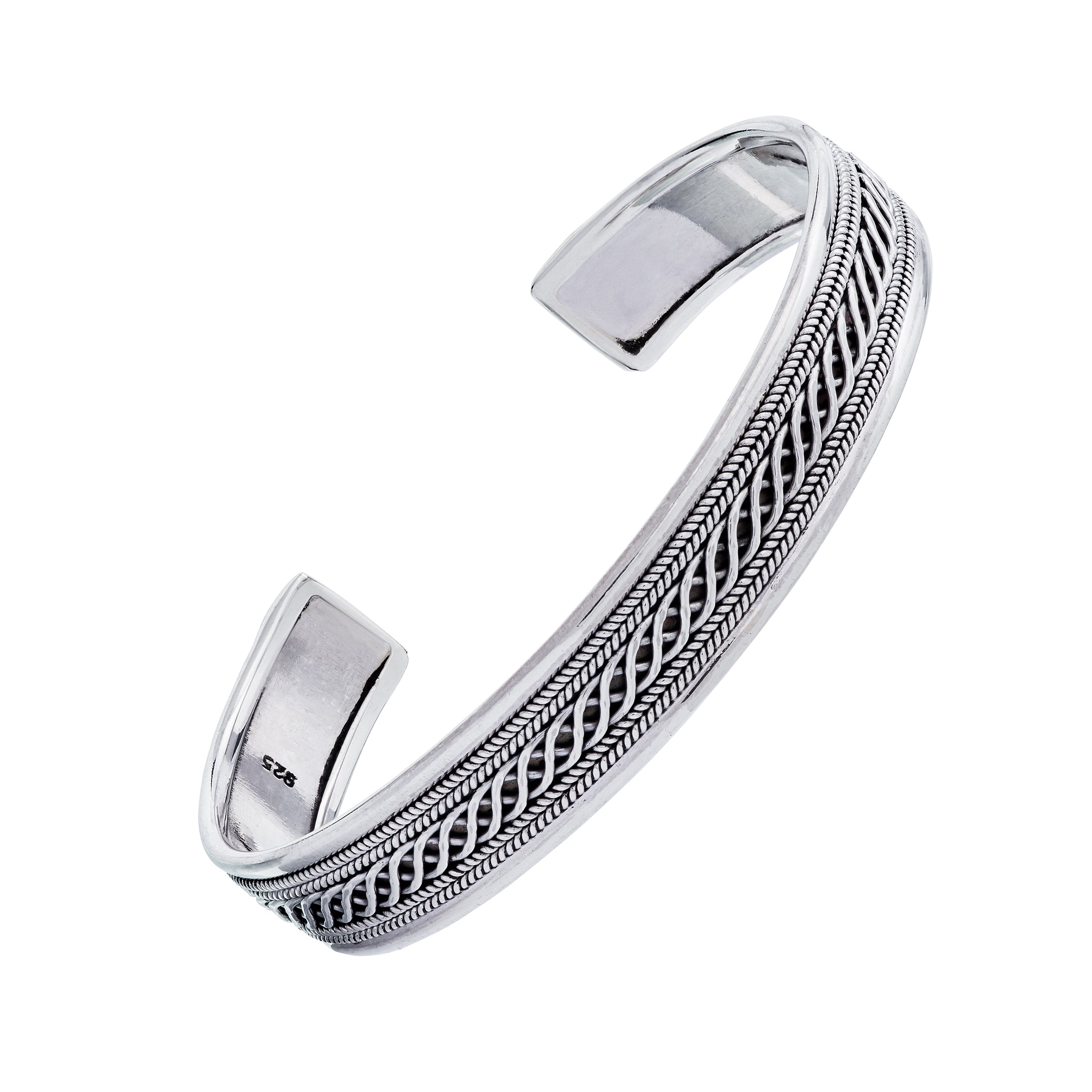 Sterling silver wide Balinese woven chain open cuff bracelet three-quarter view showing oxidized Balinese loop chain center fine rope-edge borders polished silver frame and squared flat open ends by Jan Leslie