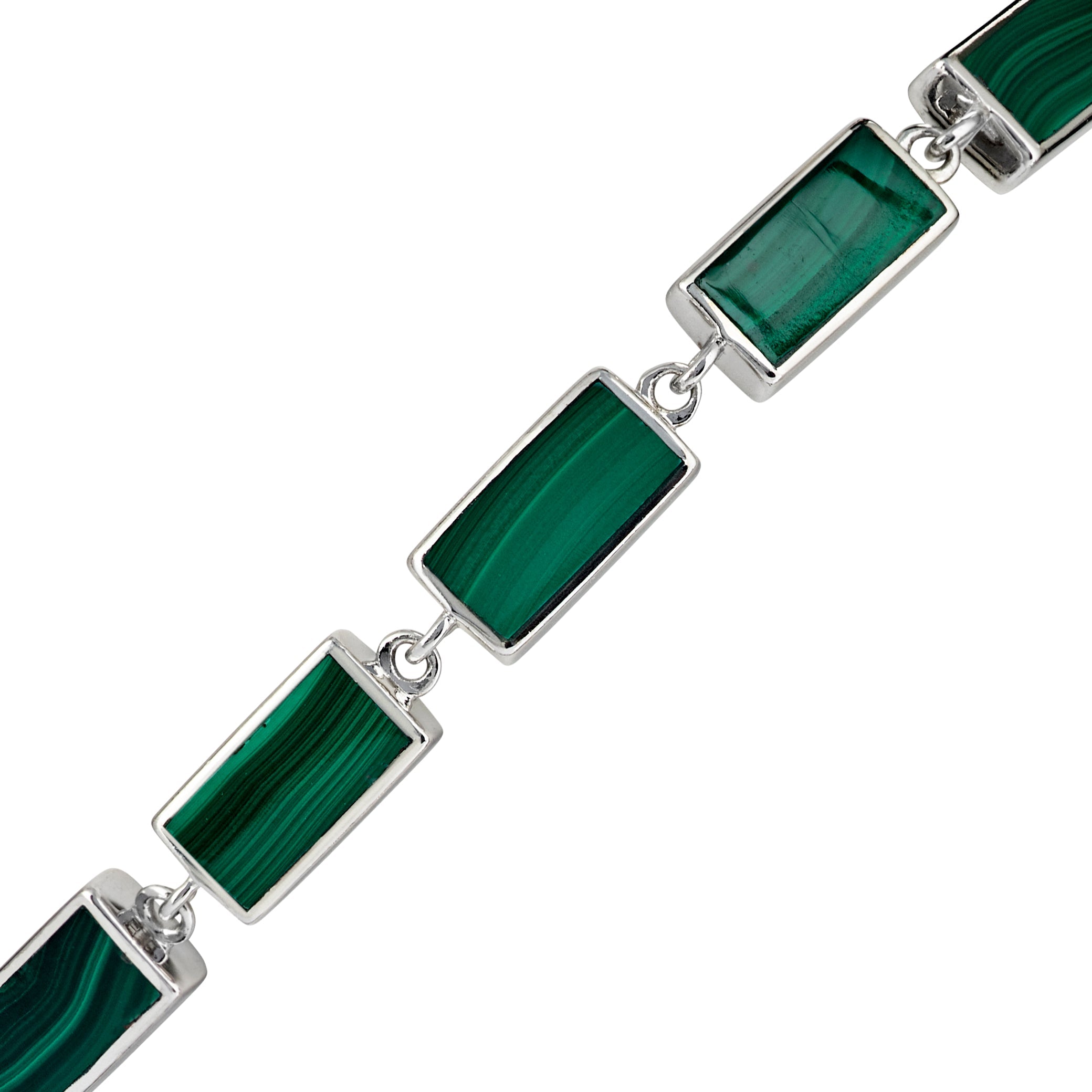 Sterling silver malachite rectangular station tennis bracelet close-up showing deep forest green malachite with vivid emerald banding and natural black matrix in polished silver chamfered bezels with direct jump ring connections by Jan Leslie