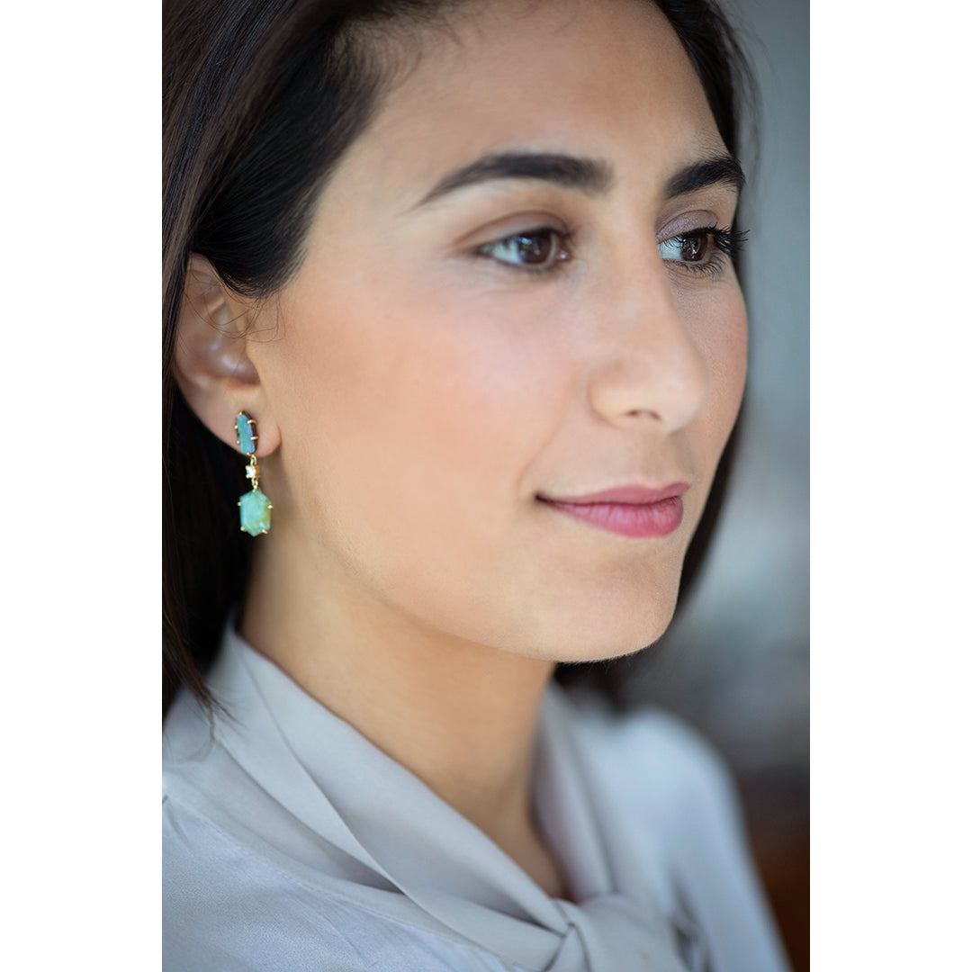 Model wearing Corsica 18K Gold One of a Kind Earrings. 