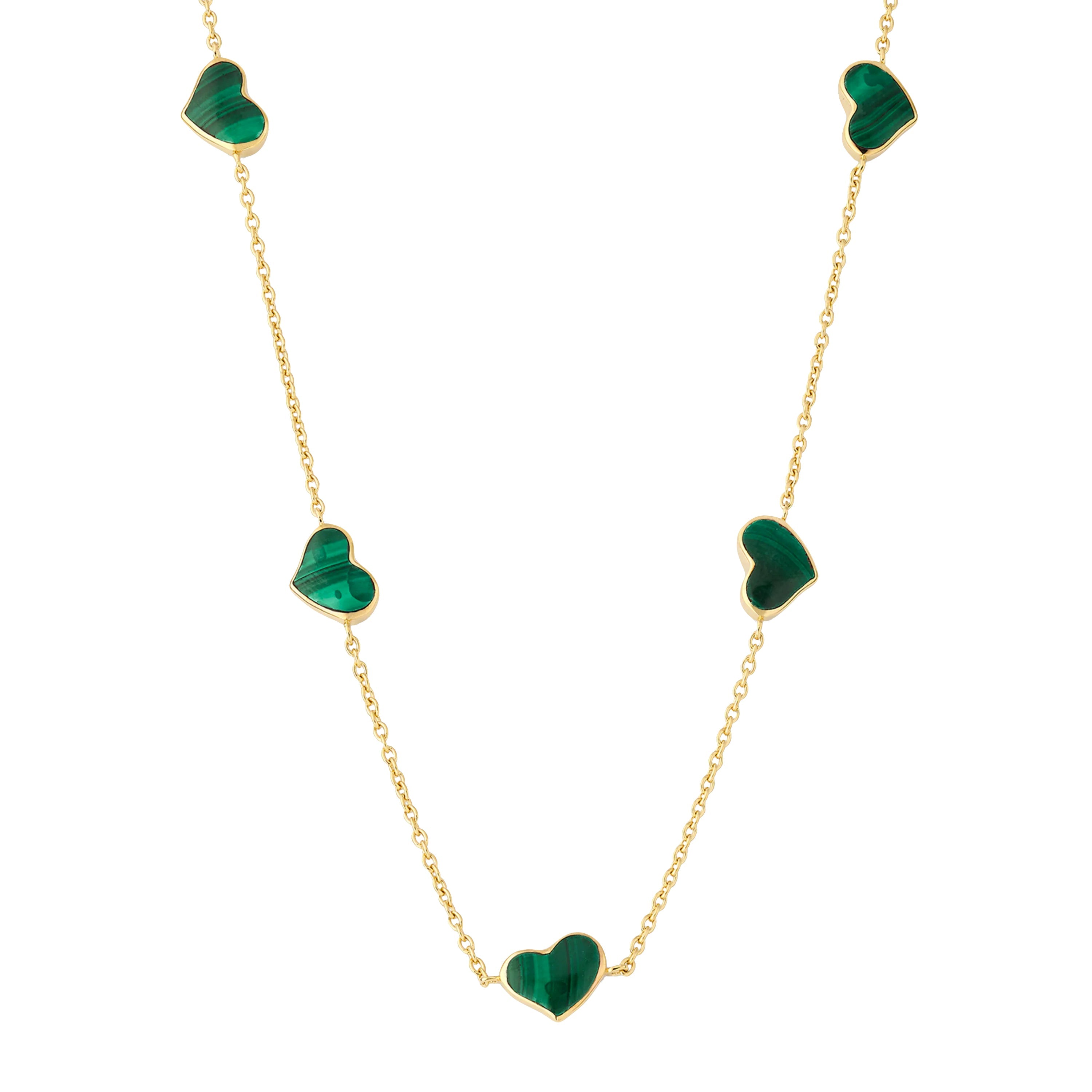 Green malachite five-heart bezel station necklace draped on gold cable chain — Jan Leslie