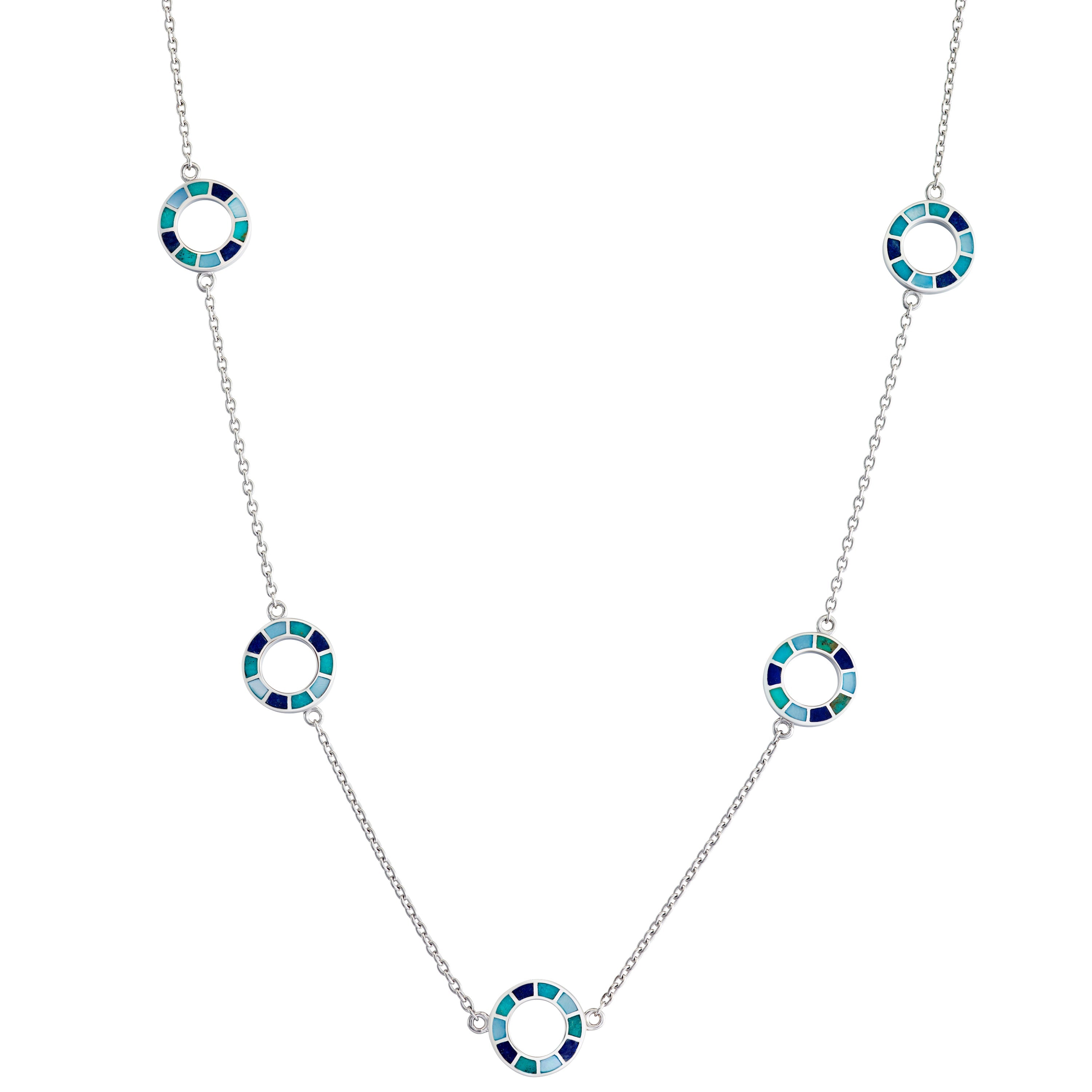 Sterling silver long station necklace with five open circle pendants featuring segmented blue and teal enamel mosaic detail.