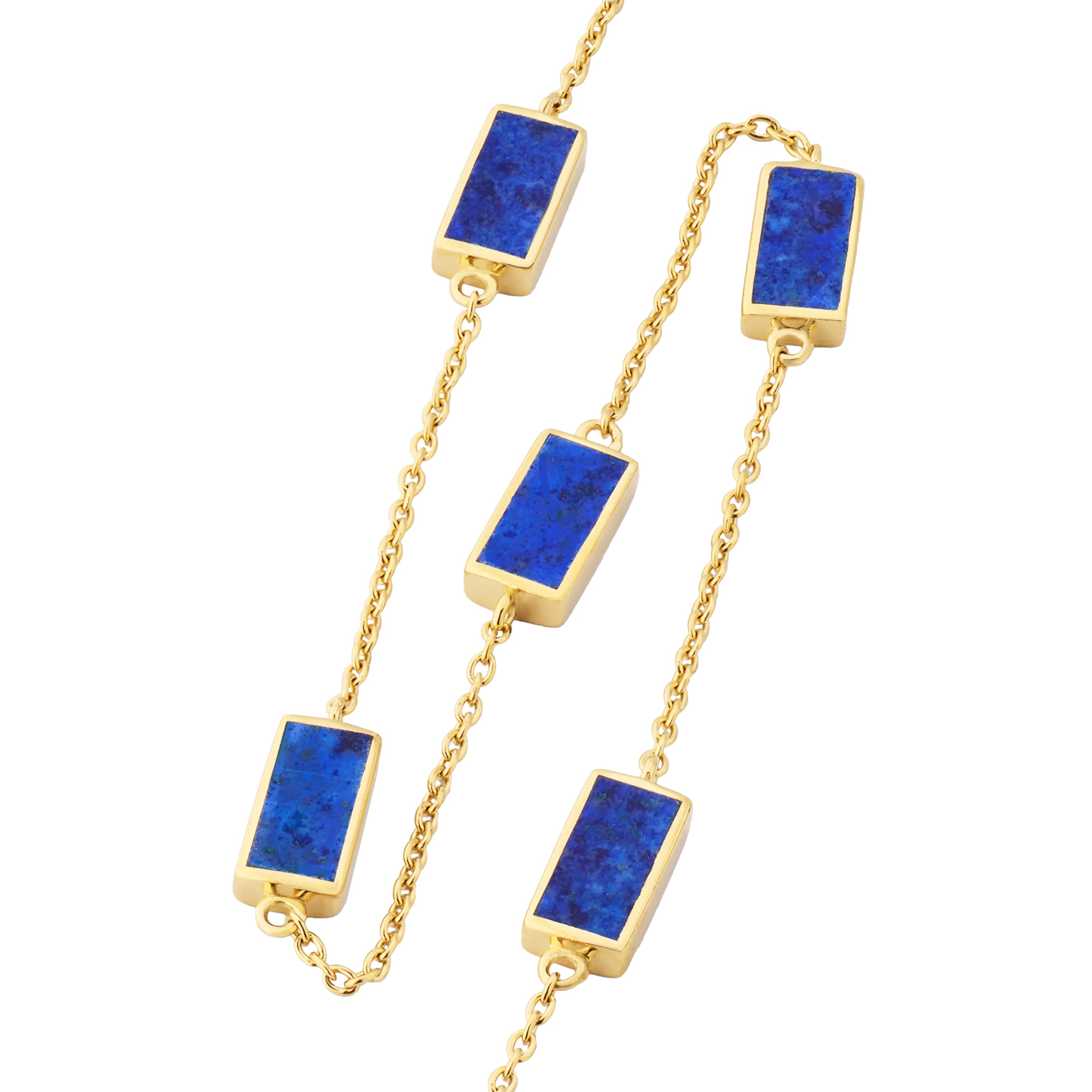 Gold cable chain station necklace with five rectangular lapis lazuli stones in gold bezel settings.