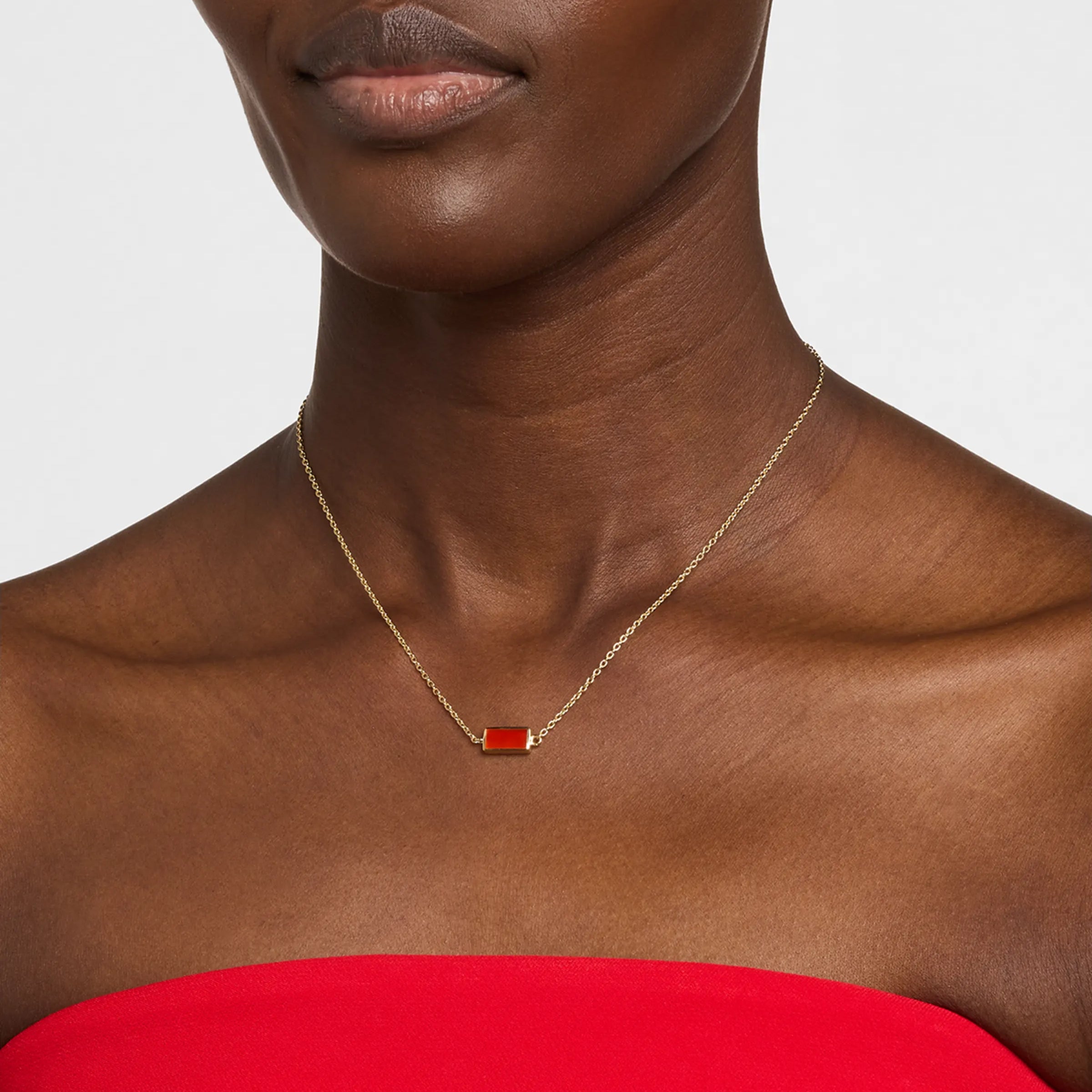  Model wearing carnelian bar pendant necklace on gold rolo chain by Jan Leslie.