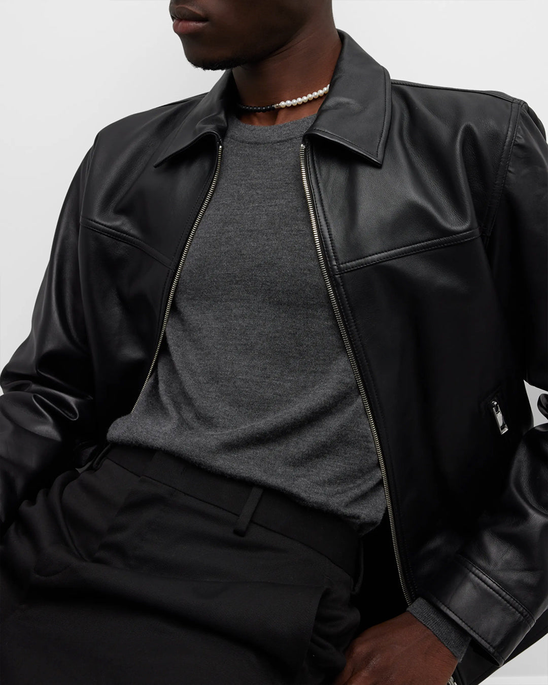 Close up of male models torso showing off the Diamond Accent Sterling Silver Freshwater Pearl & Black Agate Bead Necklace.