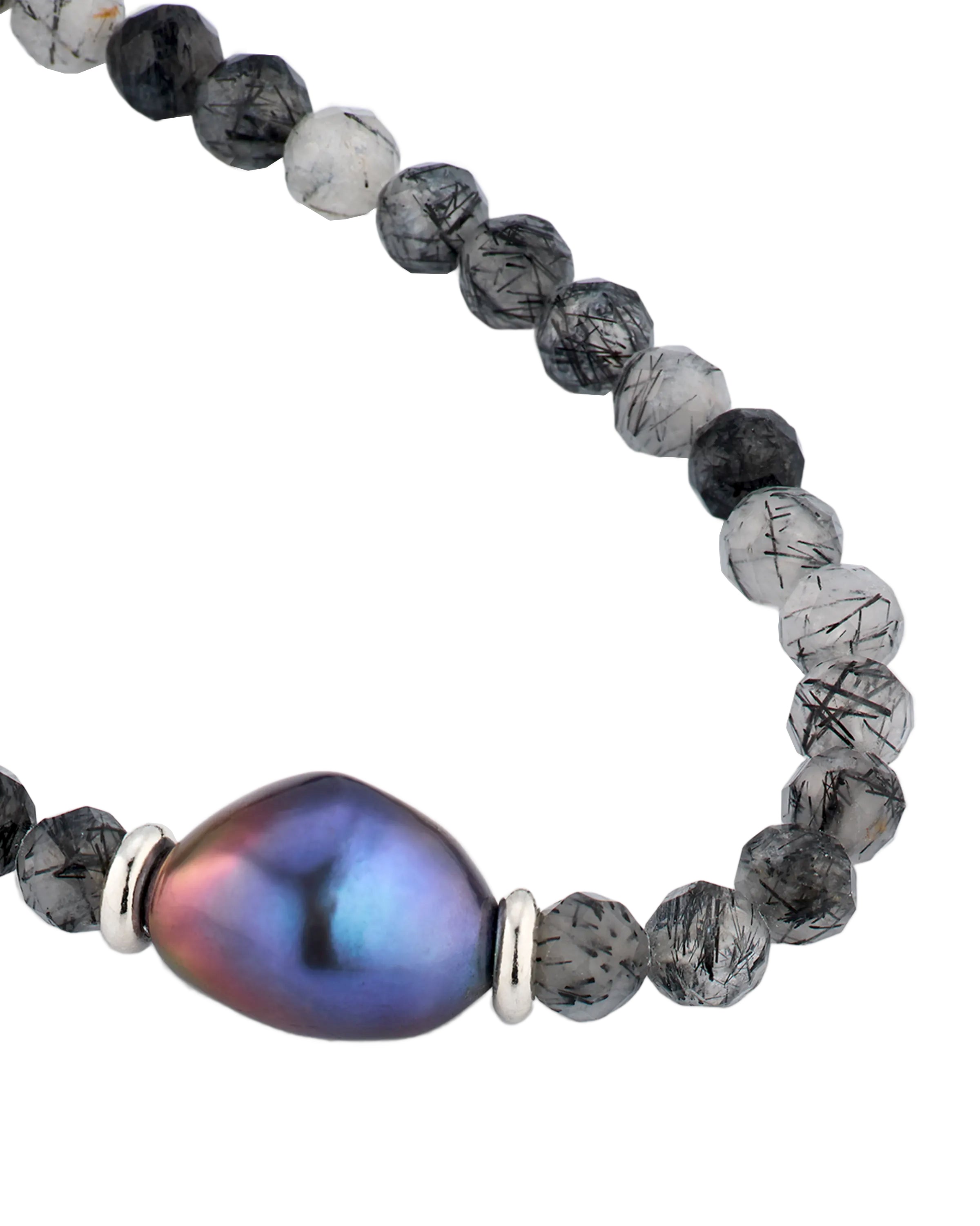  Black tourmalinated quartz bracelet close-up showing iridescent baroque peacock pearl centerpiece and sterling silver rondelle spacer detail by Jan Leslie.