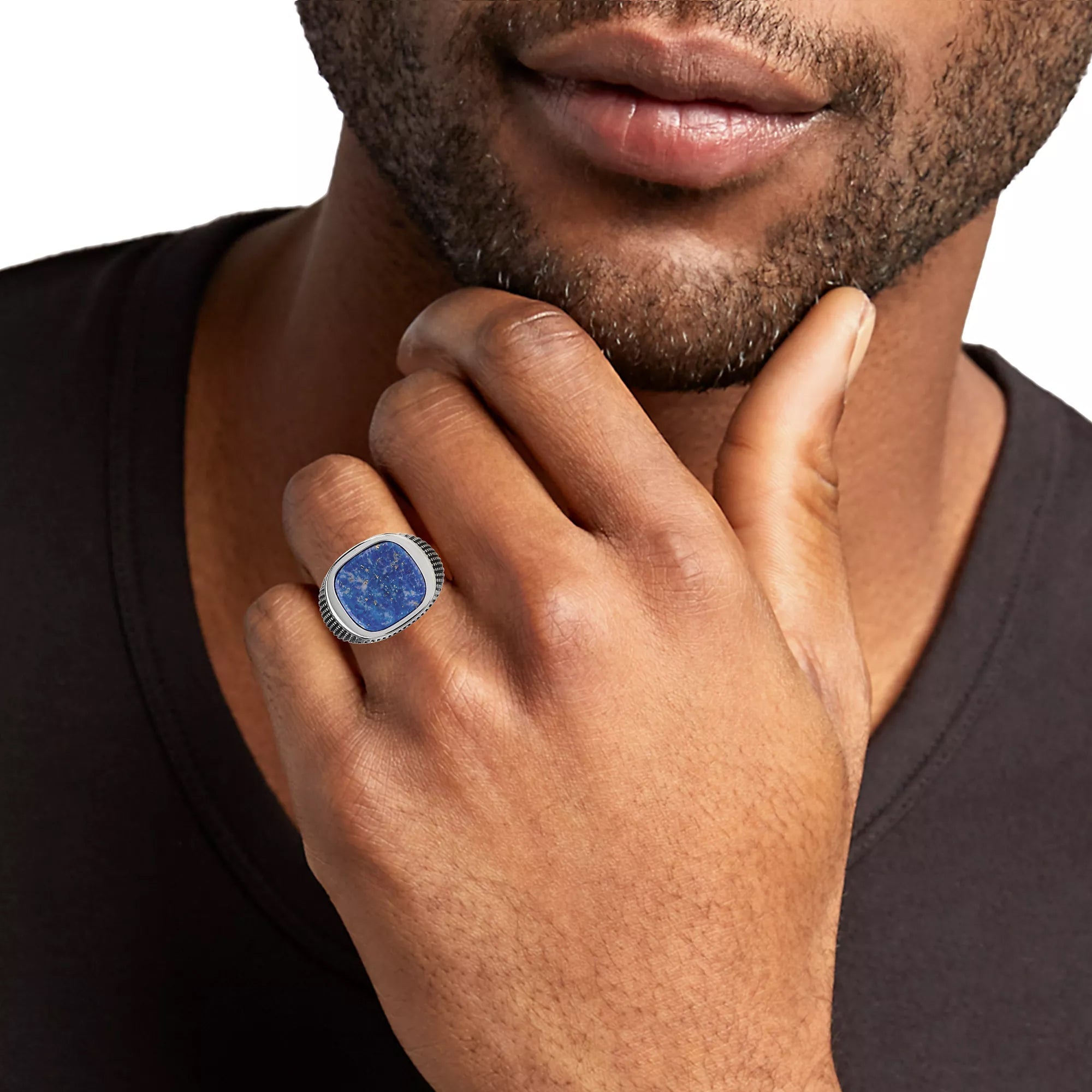 Sterling silver oxidized mesh-texture wide signet ring angled view showing deep royal blue lapis lazuli cushion cabochon natural matrix veining and full oxidized cross-hatch mesh shank by Jan Leslie