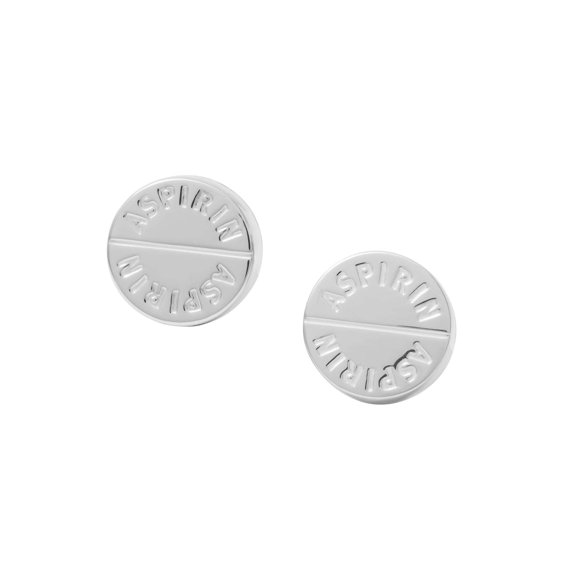 Front face view of sterling silver aspirin tablet cufflinks with embossed ASPIRIN text and score line detail, luxury novelty men's fine jewelry.