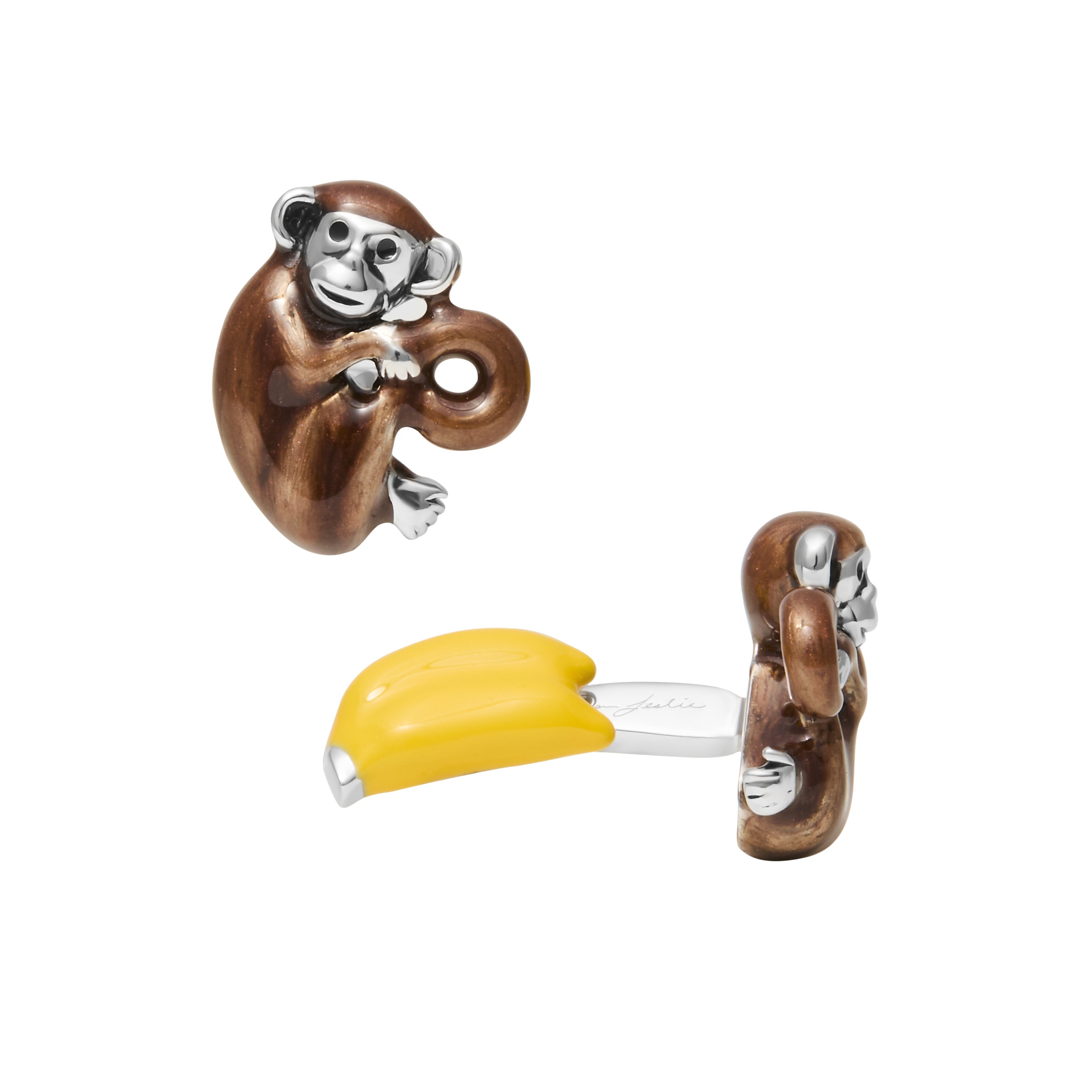 Back view of sterling silver 3D monkey cufflinks showing yellow enamel banana T-bar back closure with Jan Leslie engraved signature, luxury novelty men's fine jewelry.