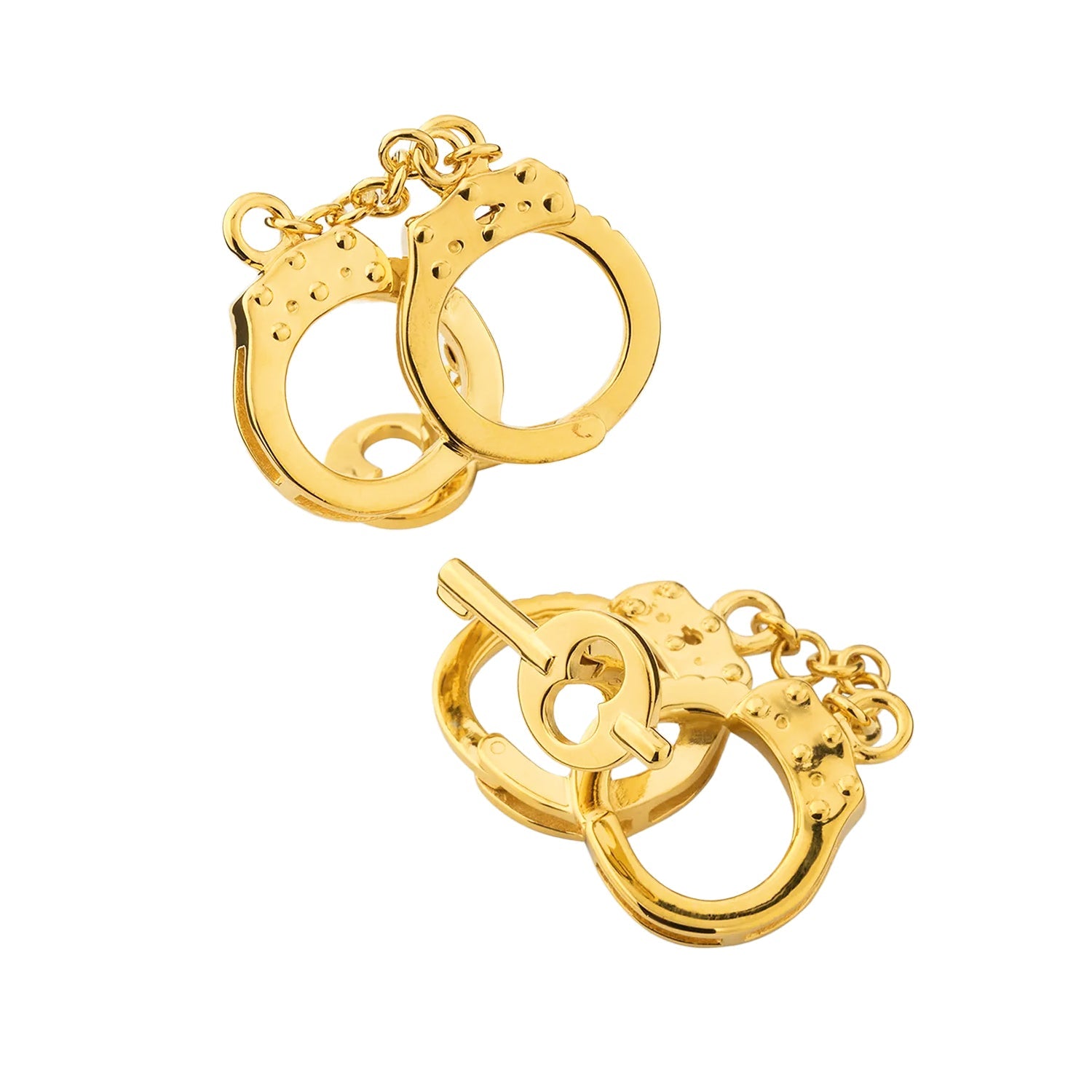  18K gold vermeil sculptural handcuff cufflinks pair angled front view showing double-ring cuff design studded ratchet bar keyhole detail and miniature chain link connector with gold key charm by Jan Leslie